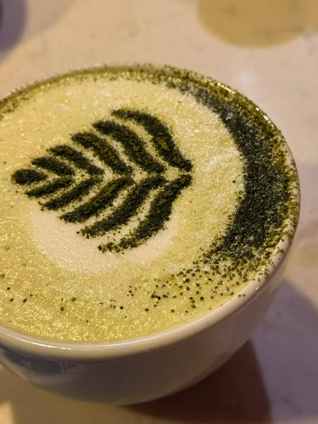 A latte finished with leaf latte art at the Bankside & Co. Coffee Lounge.