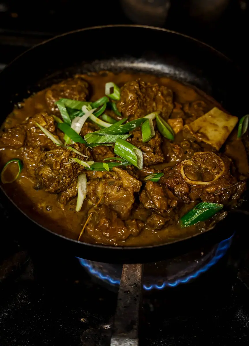 Caribbean curry simmering in a pan in the Bankside & Co. kitchen.